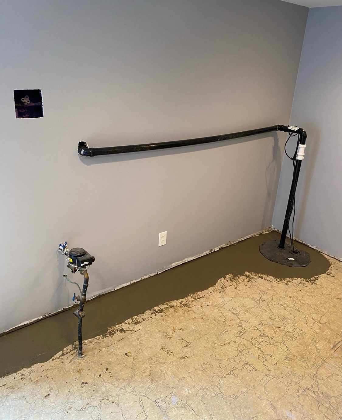 A sump pump installed by Mansour's Innovations